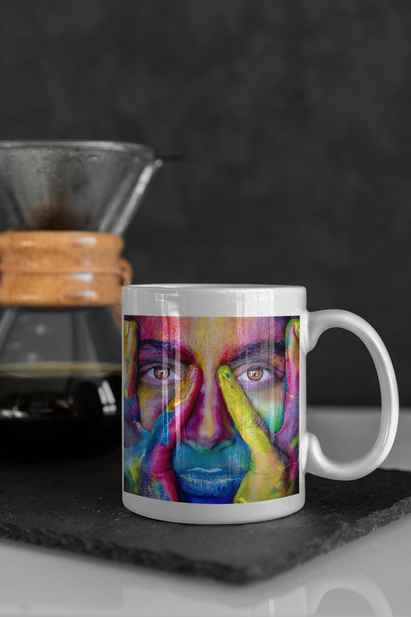 Painted woman. Beauty on a mug.  rainbow art.  coffee mug.  Hypnotic eyes